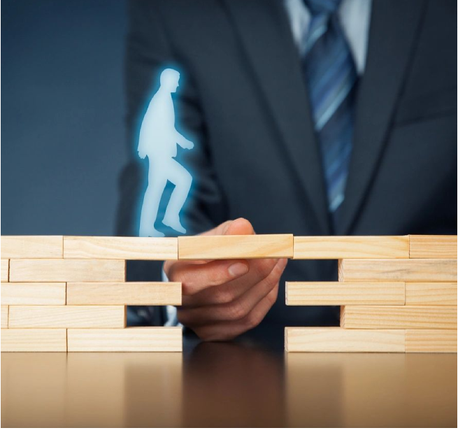 A man in a suit and tie holding onto some wood